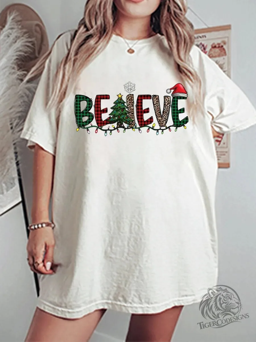 Christmas Believe Snowflake Santa Hat Holiday Lights Graphic T-Shirt