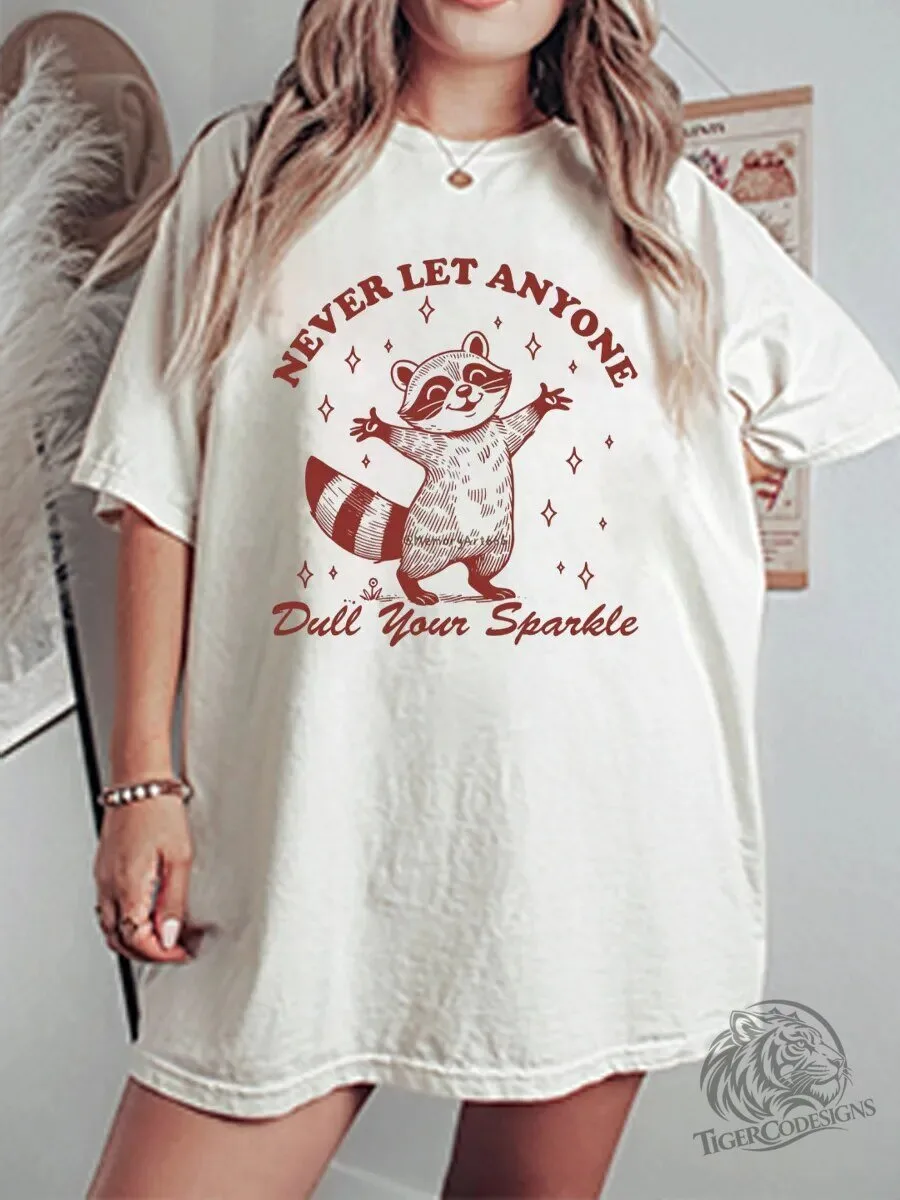 Never Let Anyone Dull Your Sparkle Raccoon Graphic T-Shirt